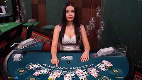 A live croupier at an Apple Pay casino