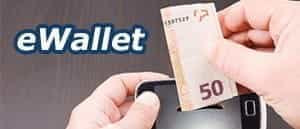 An image of money being put into a phone, with the title eWallet.