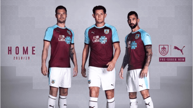 Ashley Barnes, James Tarkowski and Steven Defour model the new Burnley home kit.