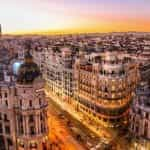 Gran Via in Madrid at sunset.