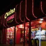 Neon signs indicate a casino location.