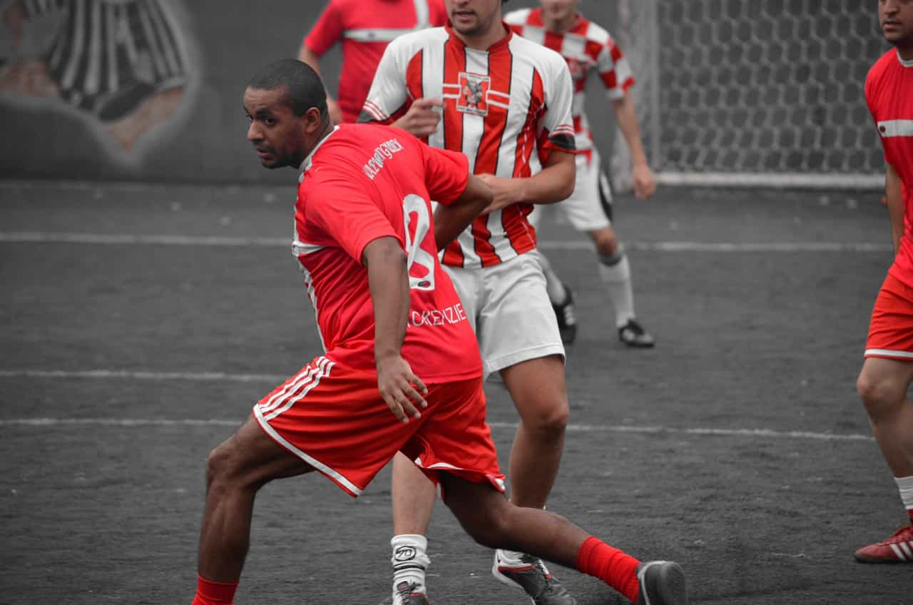 Football players engaged in a match.