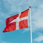 Denmark’s flag against a blue sky