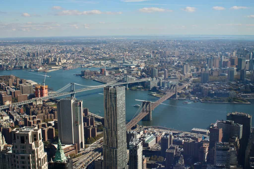 A view of Brooklyn from downtown Manhattan in New York City, with two bridges connecting the two over the East River.